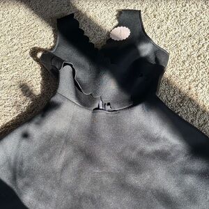 Elegant Black Sleeveless Dress size medium cut out center